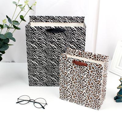 China Recycled Materials Wholesale Custom Logo Printing Luxury Marble Pattern Strong Paper Bag With Handle Shopping Paper Bags for sale