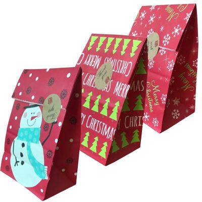 China 2022 Materials Christmas Tree Star Shape Recycled Gift Paper Bag Cheap Candy Bag With Handles Printing Custom Paper Bags for sale