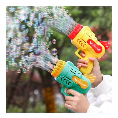 China 2022 New Mini Baby Bubble Gun Electric Toy Gatling Bubble Gun Electronic Outdoor Toy 29 Holes for sale