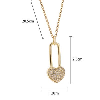 China Hiphop Stainless Steel Block Paved Ladies Gems Stone Pendant 18K Black Gold Heart Lock Pendant Necklace for sale