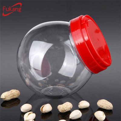 China 1 Liter Ball Shaped Food, PET Biscuits Jar And Plastic Handle Lid Wholesale, Plastic Biscuits PET Jar Bottle for sale