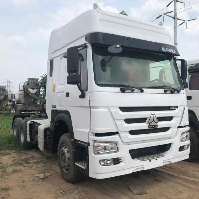 China Direct selling cng III howo a7 EURO used sinotruck tractor truck with low price 7000x2500x3800 for sale