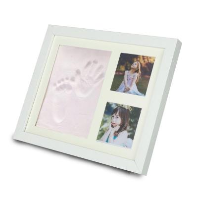 China Baby 2020 home decoration newborn baby foot print photo frame 12 month baby photo frame baby gift for sale