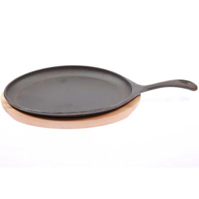 China Sustainable Cast Iron Sizzling Wooden Base Tray Oval Serving Griddle for sale