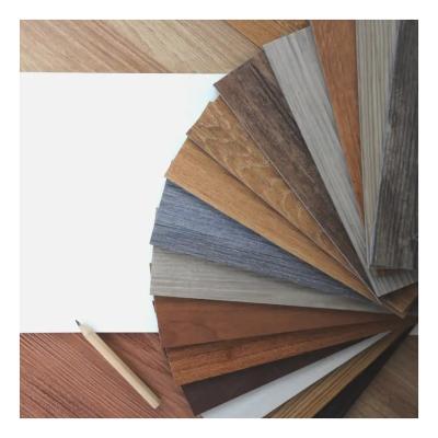 China Raincoat ; China supplier cheap pric dry back floor fireproof, factory sale pvc stone vinyl plastic plank flooring for sale