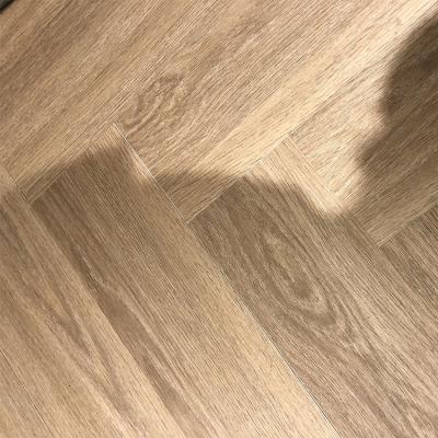 China Raincoat ; Fireproof Newest Popular Spc Wood Herringbone Click Lock Modern PVC Tile SPC Flooring for sale