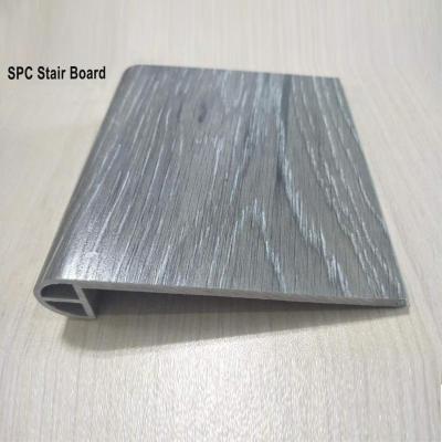 China Raincoat ; Fireproof Waterproof Decorative Flooring Accessories Skirting SPC Stair Panel for sale