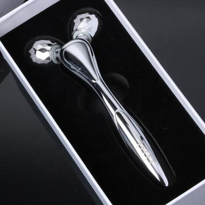 China Anti-puffiness Multi-angle Design Body Roller Rotating Silver Electroplating Facial Massager for sale