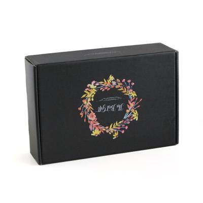 China Logo New Simple Folding Packaging Box Luxury Black Customized Recyclable Corrugated Clothing Leather Paper Box for sale