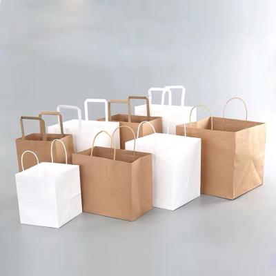 China Fancy Recyclable Custom Printed Kraft Paper Shopping Paper Bag Printing Custom Gift Gift Packaging Bag for sale