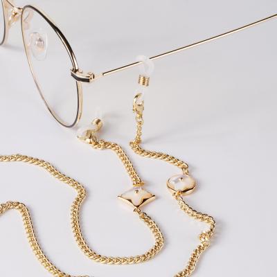 China New fashion sweater necklace shell four-leaf clover glasses hanging chain accessories hanging chain earphone anti-lost chain for sale