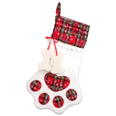 China Manufacturer Personalized Large Plaid Folding Dog Paw Christmas Ornament Stockings Gift Bags for sale