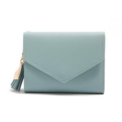 China 2021 New Design Women Solid Colors Waterproof Short Wallets Small With Heart Tassel Hor Sale for sale