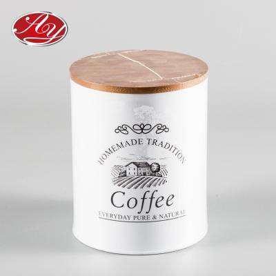 China Food Grade Eco - Friendly And Recyclable Material Round Coffee Tin Box With Bamboo Lid for sale