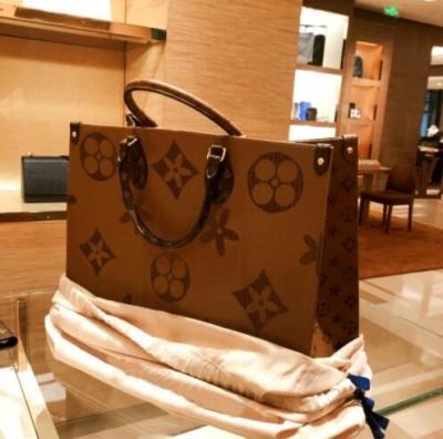 China 1:1 motion detection leather 5ALU trend high-definition luxury new flower color matching old handbag with shopping bag women's bag for sale