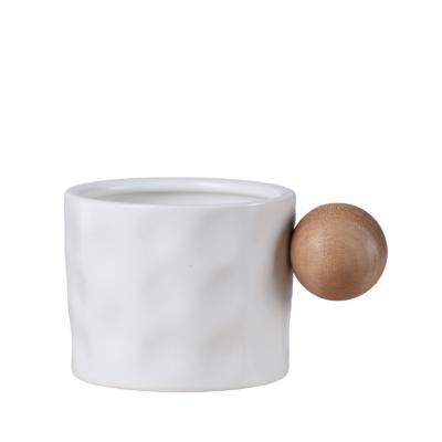 China Household Spherical Water Cup Handle Water Level Appearance Ceramic Mug Viable Portable High Design Sense Wooden Coffee Mug for sale