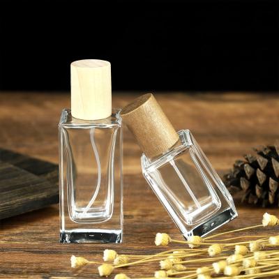 China Cosmetic new factory square tube glass perfume bottle with sprayer for sale