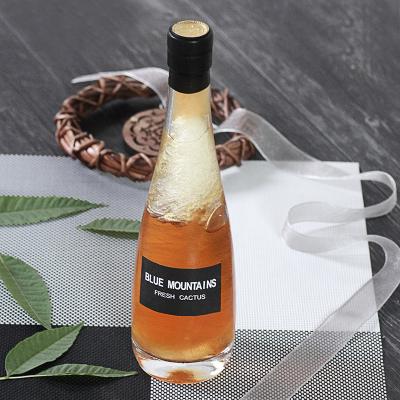 China Beverage 500ml high-grade water drop shaped transparent glass beverage bottle wine bottle for sale