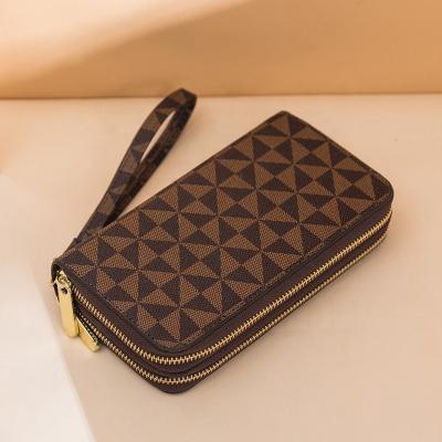 China Women's Wallets PU Wallets Designer Style Brands Wristlet Bag Waterproof Luxury Famous Purses Women Men Leather Card Holders Women's Wallets for sale