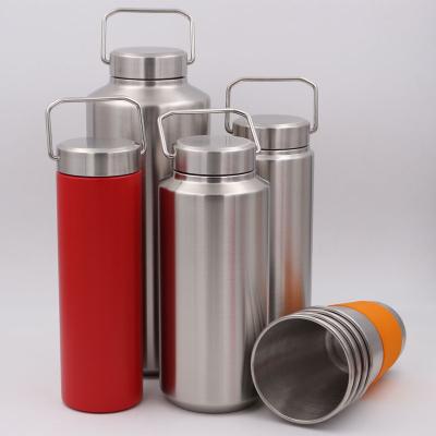 China Viable Wide Type Food Grade Stainless Steel Mouth Flasks Water Bottle and Metal Lid with Flip Up Carry Handle for More Insulation for sale