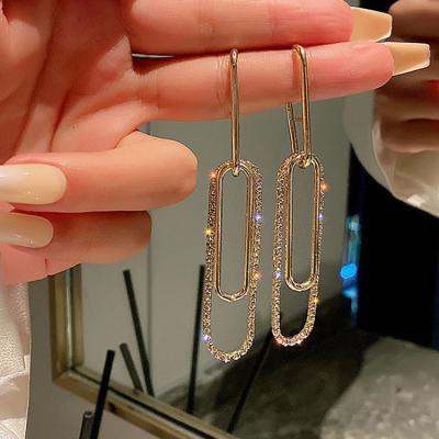 China Trendy Fashion Hot Selling Shiny Crystal Safety Pin Drop Gold Earrings Long for sale