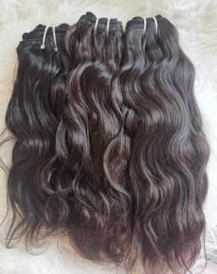 China Good Quality Hair Bundles Last Over 5 Years Natural Brown Unprocessed Raw Natural Wavy Hair Bundles Indian Hair Weaves Weft Extensions for sale