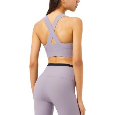 China New 2022 Spring Sports Bra Antibacterial Comfortable V-Neck High Rib Cross Back Sexy Yoga Underwear Made Women Fitness OEM Custom Logo for sale