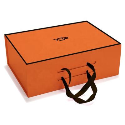 China Recyclable Wholesale Orange Cardboard Apparel Packaging Boxes Backpack Luxury Rigid Paper Gift Box With Magnetic Closure for sale