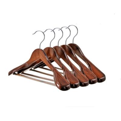 China Luxury Wooden Suit Hanger Bold Round Wooden Hook Original Modern Non-slip Color With Black Rubber Hose Cross Bar for sale