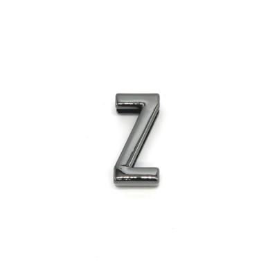 China Eco-firendly High Quality Hand Polished Decorative DIY Bag Metal Letter 24mm Slide Letter Charms for sale