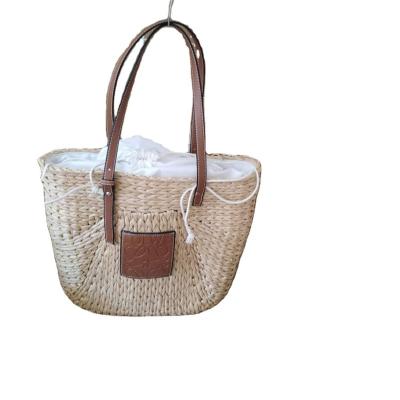 China 100% Eco-friendly Handwoven Straw Handbags For Ladies In Large Capacity for sale