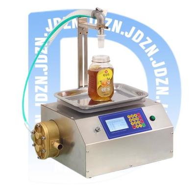 China Accurate Liquid Filling Machine for Honey Sesame Paste Edible Oil Glue Viscous Liquid for sale