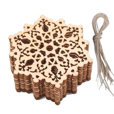 China Eco-Freindly 10pc European Christmas Hollow Snowflakes Wooden Pendants Ornaments For Christmas Tree Ornament Christmas Party Decorations Kids Gift for sale