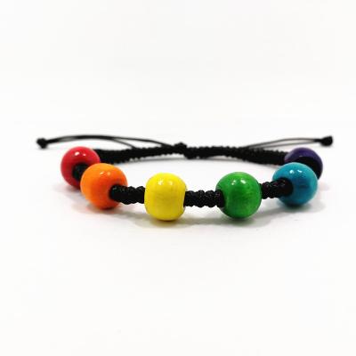 China Gussy Handmade Jewelry Life Wooden Women Colorful Wooden Beads Charm Braided Bracelet LGBT Pride Gay Lovers Beaded Bracelets Girls Gifts for sale