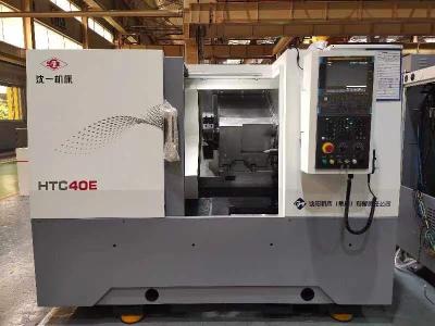 China El CNC inclinado horizontal de la cama HTC40E/500 tornea el control SMTCL SYMG del motor GSK988TA Fanuc de 15KW 11KW en venta