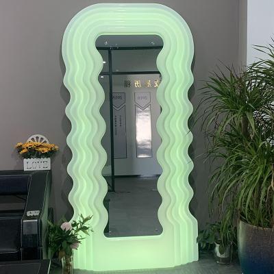 China Dimming Light Standing Mirror Living Room Or Bedroom Light Luxury Wavy Rectangular Irregular Mirror for sale