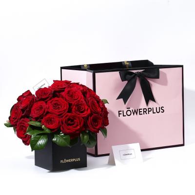 China Customized Recyclable Luxury Boutique Logo Paper Gift Elegant Paper Black Shopping Bags Recyclable With Ribbon Wedding Paper Gift Bags for sale