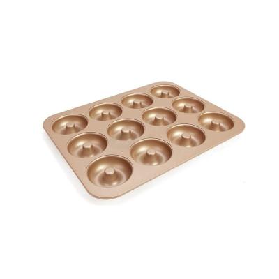 China Carbon Steel Viable Gold Non-Stick Cavity Baking Tool With Hole Mold Utensils Donut Cake Baking Mold for sale