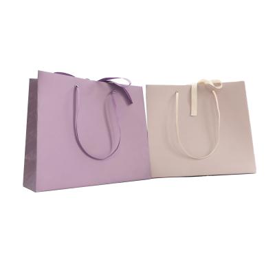 China Recyclable Matt Paper Bag Gift Christmas Purple Beige Natural Shopping Paper Bag for sale