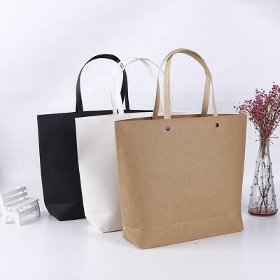 China Handmade Customized Wholesale Custom Printed Decorations Luxury Gift Paper Bag With Handle Brown Kraft Paper Bag Shiny Surface for sale