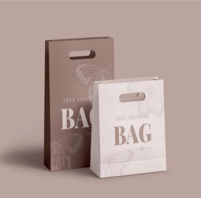 China Recycled materials factory customized creative portable paper bag European and American style kraft paper gift for sale