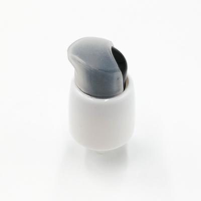 China Non Puddle Treatment Cream Pump Dust Cap Smooth Half Treatment Pump For Facial Care for sale