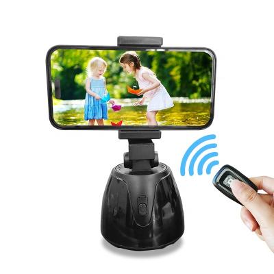 China 360 Rotatable Smart Tracking Adjustable Auto After Face Object Tracking Smart Shots Phone Mount Sensor Stand Personal Tripod for sale