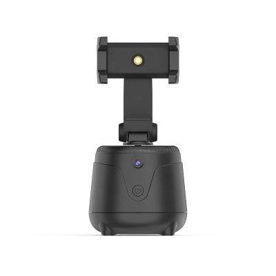 China AI Adjustable Auto Face Tracking Camera Phone Tripod 360 Degree Phone Auto Tracking Smart Shooting Bracket for sale