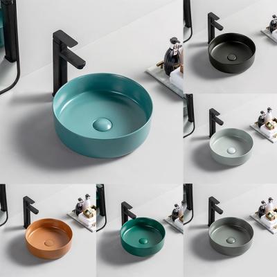 China High Grade EUROPEAN Hotel Round Ceramic Bathroom Sink Bathroom Sink Above Counter Matte Color Art Wash Sinks for sale