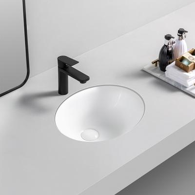 China Logo Design Small Oval Bathroom Easy Clean Ceramic Undermount Sinks Sanitary Ware Under Counter Sink for sale