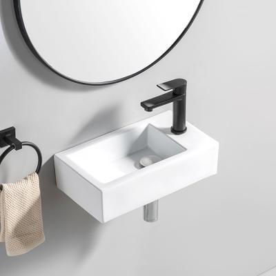 China Modern custom made mini pia do banheiro small size wall mounted bathroom basin pure white ceramic solid outdoor sink for sale