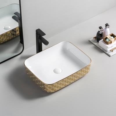 China Customized Luxury Royal Bathroom Durable Waschbecken Rose Golden Ceramic Wash Basin Sink Gold Art Basin for sale