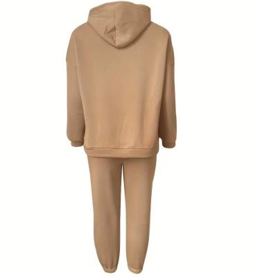 China Anti-wrinkle Solid casual two piece set kangaroo pocket long sleeve hoodies and high waist jogger pants outfits for sale