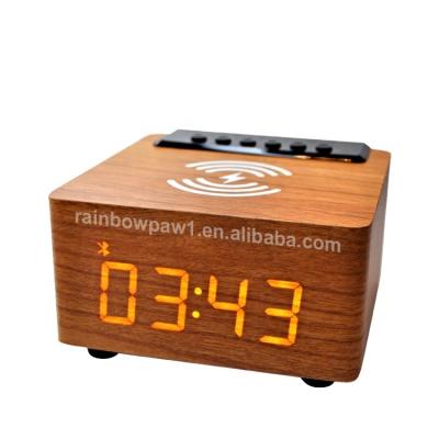 China No K2 Tending Products Portable Wooden Mini Alarm Clock Subwoofer Speaker Radio Speaker With Wireless Charger for sale